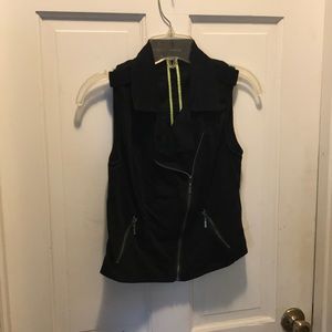 Maurice’s black moto vest